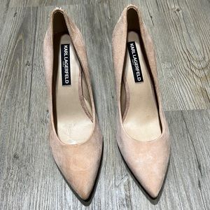 Pink nude suede pumps.